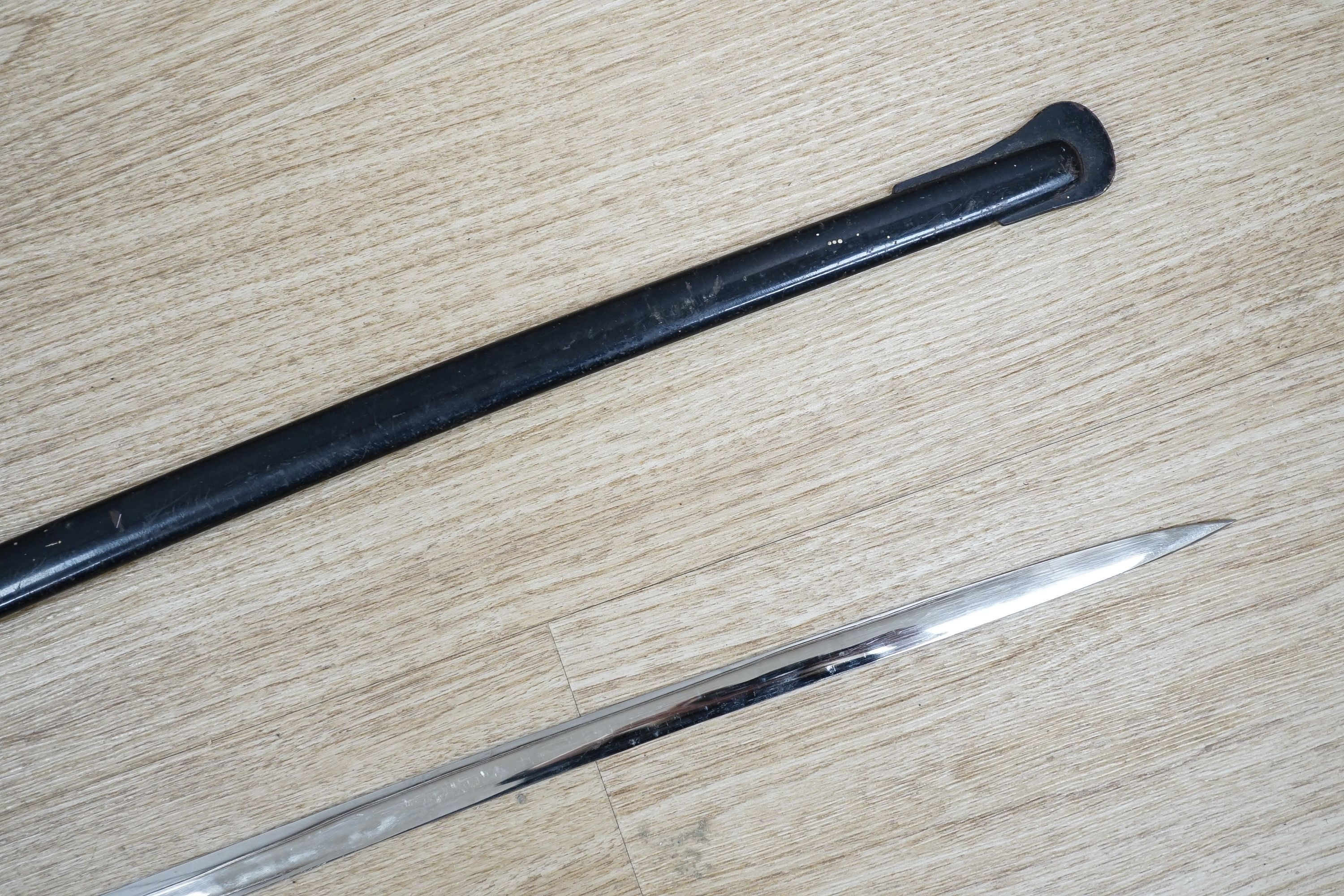 A German cavalry dress sword, provenance Desert Rats, length 102cm
